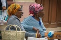 Havana, Cuba - 09 January, 2017: black women sitting near a street in Cuba Royalty Free Stock Photo