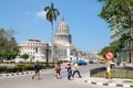The Capitol building, people and classic cars in downtown Havana