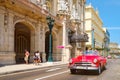 Classic car next to the Great Theater and famous hotels in Old Havana