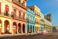 Classic old cars and colorful buildings in downtown Havana