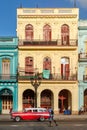 Classic old cars and colorful buildings in downtown Havana Royalty Free Stock Photo