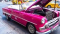 Havana, Cuba - May 02, 2019: pink Chevrolet convertible classic car. repair of taxi grancar Royalty Free Stock Photo