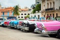 Havana, Cuba - November, 2018: Colorful vintage classic American cars parked on the street of Old Havana, Cuba Royalty Free Stock Photo