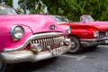 Havana, Cuba - November, 2018: Colorful vintage classic American cars parked on the street of Old Havana, Cuba Royalty Free Stock Photo