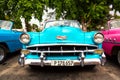 Havana, Cuba - November, 2018: Colorful vintage classic American cars parked on the street of Old Havana, Cuba Royalty Free Stock Photo