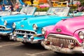 Havana, Cuba - November, 2018: Colorful vintage classic American cars parked on the street of Old Havana, Cuba Royalty Free Stock Photo