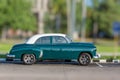 HAVANA, CUBA-OCT 26-Green, old, antique, made over vehicle resembling 1950 American car in Havana