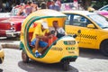 Coco taxi on the street of Havana, capital city of Cuba Royalty Free Stock Photo