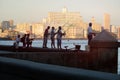 Fishermen at dawn on the famous Malecon seawall in Havana Royalty Free Stock Photo