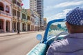 Taxi driver driving with classic, vintage, old American car Royalty Free Stock Photo