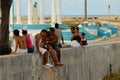 People relax at the sea-front in Cojimar, Cuba.