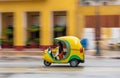 HAVANA, CUBA - OCTOBER 21, 2017: Yellow Tuk Tuk in Havana, Cuba. Taxi Vehicle Royalty Free Stock Photo