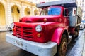 Red classic American truck on the streets of Havana Royalty Free Stock Photo