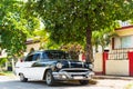 American Black White 1956 Vintage Car Parked In The Sidestreet Before A House In Varadero Cuba