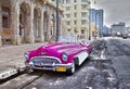 HAVANA- JANUARY 27, 2013: Old American retro car 50th years of the last century, an iconic sight in the city, on the Malecon str Royalty Free Stock Photo