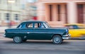 HAVANA, CUBA - OCTOBER 20, 2017: Havana Old Town and Malecon Area with Old Taxi Vehicle. Cuba. Panning. Royalty Free Stock Photo