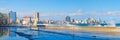 The Havana skyline with sea waves crashing on the Malecon seawall