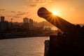 Havana at sunset with the silhouette of an old cannon on the foreground Royalty Free Stock Photo