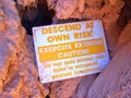 Havasupai Falls Danger Sign, pools, blue water, geological formation rock walls Royalty Free Stock Photo