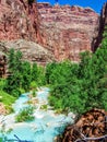 Havasupai Falls, pools, blue water, geological formation rock walls Royalty Free Stock Photo