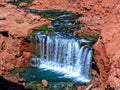 Havasupai Falls, pools, blue water, geological formation rock walls Royalty Free Stock Photo