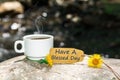 Have a blessed day text with coffee cup Royalty Free Stock Photo