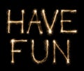 Have fun text written with sparkler letters Royalty Free Stock Photo