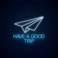 Have a good trip glowing neon banner with paper airplane sign and text. Bon voyage wish banner. Vector illustration