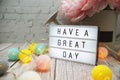 Have a Great Day text on lightbox on wooden background Royalty Free Stock Photo