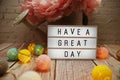 Have a Great Day text on lightbox on wooden background Royalty Free Stock Photo