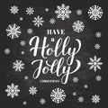 Have a Holly Jolly Christmas calligraphy hand lettering on chalkboard background with snowflakes. Vector template for Royalty Free Stock Photo