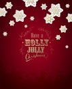 `Have a holly jolly Christmas` with lots of snowflakes on red ba Royalty Free Stock Photo