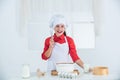 have an idea. time to eat. happy child cooking in kitchen. bake cookies in kitchen. professional and skilled baker. kid Royalty Free Stock Photo