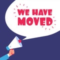 We have moved. Moving in new office. Business vector concept with megaphone