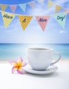 Have a nice day card background, celebration new day with a cup of coffee over the blurred beach background Royalty Free Stock Photo