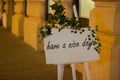 have a nice day sign outside a coffee shop on a tripod with flow Royalty Free Stock Photo