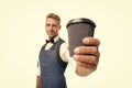 Have nice day. Take your coffee. Barista in apron served coffee. Coffee shop concept. Mature barista hold drink. Try