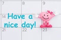 Have a nice day today message on a calendar with a happy smiling heart