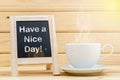 Have a nice day word on chalkboard and coffe Royalty Free Stock Photo