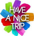 Have a nice trip paper word sign with colorful spectrum paint brush strokes over white Royalty Free Stock Photo