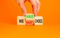 We have or not choice symbol. Concept word We have or have not choice on beautiful wooden cubes. Beautiful orange table orange Royalty Free Stock Photo