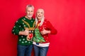 We have perfect style concept. Photo of cheerful cool cheerful excited granddad and granny making finger up sign hugging Royalty Free Stock Photo