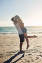 We have that special kind of love. Shot of a loving couple sharing a kiss while spending time at the beach. Royalty Free Stock Photo