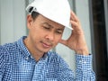 Have stress, Asia Engineer serious thinking, young man and looking away while sitting
