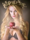 Have you fallen under the spell of her feminine charm. Studio shot of a gorgeous young woman offering a magical red