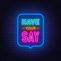 Have Your Say neon sign in the speech bubble on brick wall background. Royalty Free Stock Photo