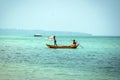 Local fishermen with boat in sea