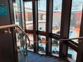 The Haven circular staircase going between floors on the Norwegian Escape cruise ship