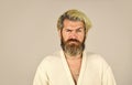 Having bad mood. man wear underwear. Man in bathrobe at the bathroom. handsome guy in the morning. bearded man in white Royalty Free Stock Photo