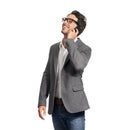 Having a friendly phone conversation. A handsome young man talking happily on his cellphone. Royalty Free Stock Photo